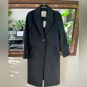 New with tags—women’s beautiful wool blend tailored top coat.